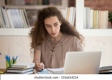 Graduate student writing a research paper